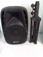 Front view of Sonart speaker next to folded tripod