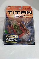 Front view of sealed Titan A.E Deluxe Power Crush Exo Suit and Cale figure in blister pack