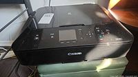 Top/front view of Canon MG5420 printer showing control panel and exterior