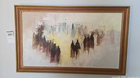 Full view of framed abstract painting on wall