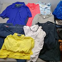 Assorted garments laid out showing all eight pieces