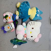 Group shot of all five plush toys