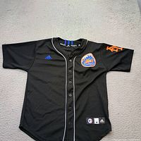 Front view of Adidas New York Mets David Wright youth jersey showing chest patch, piping, sleeve detail and hem tags