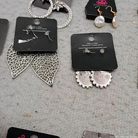 Paparazzi jewellery pieces on display cards showing new condition