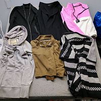 All six garments laid out front view