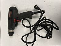 Full view of Craftsman corded drill with attached power cord