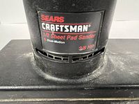 Brand plate showing Craftsman logo, 1/2 Sheet Pad Sander, Dual-Motion, 3/8 HP