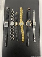 Six wristwatches laid out showing overall styles and quantities