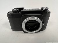 Front view of Nikon FX-35 body showing F-mount opening and shutter curtains