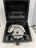 Circular saw inside plastic case