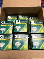 Box containing multiple SLI Lighting HI-PAR 30 bulb cartons