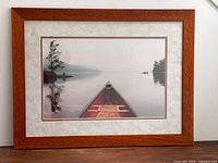 Full view of framed photograph standing on surface
