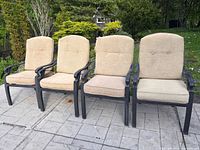 Four chairs with cushions front view