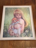 Full view of framed print on tabletop
