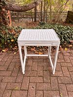 Full view of white wicker rattan square side table