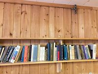 Full shelf view showing quantity and variety of textbooks