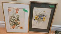 Both framed floral watercolors side by side
