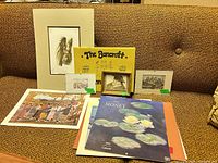 Group view of all prints, calendars, mats, and small frame