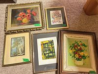 Group shot of all five framed artworks