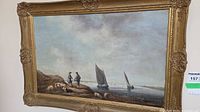 Front view of framed seascape oil painting