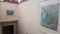 Both artworks hanging on wall for scale and context