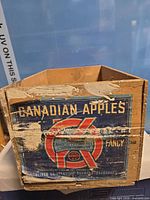 Front of crate showing Canadian Apples label