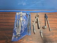 Full set showing pouch and five loose metal tools