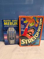 Front view of both boxed games side by side