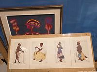 Both framed pieces: Tyrrell print set front, fabric art behind