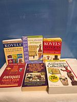 Front covers of all six price guide books