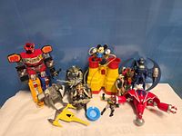 Overview of all figures, vehicles and binoculars on white background