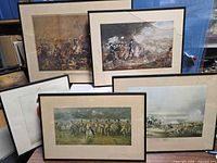 Group shot of all five framed prints showing overall subjects and frames