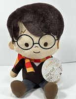 Front view of Harry Potter plush with tag