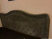 Grey tufted velvet headboard with nailhead trim