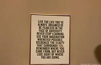 Full view of framed motivational print
