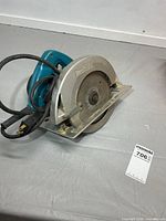 Overall view of Makita circular saw with blade guard