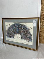 Full view of framed abstract print with grey mat and wood frame