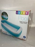 Front of box showing Intex Swim Center Family Pool image