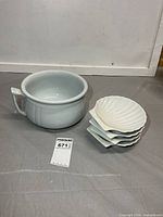 Planter and stacked shell dishes group view