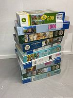 Stack of all boxed puzzles