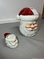 Large Santa cookie jar and small mug front view