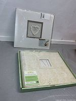 Both sealed scrapbooks front view