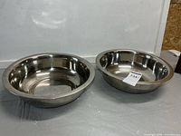 Both stainless steel bowls side by side
