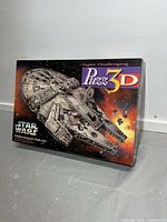 Front of Puzz 3D Millennium Falcon puzzle box