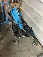 Full side view of stroller folded open