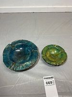 Top view showing both ashtrays, size comparison