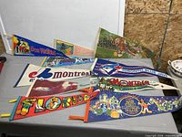 All ten pennants laid out on table