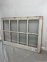 Front view showing eight panes and white distressed paint