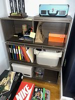 Full view of assembled six-cubby shelving unit showing overall design and color