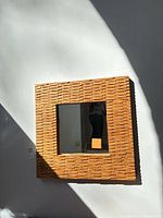 Front view showing entire mirror and textured wood frame